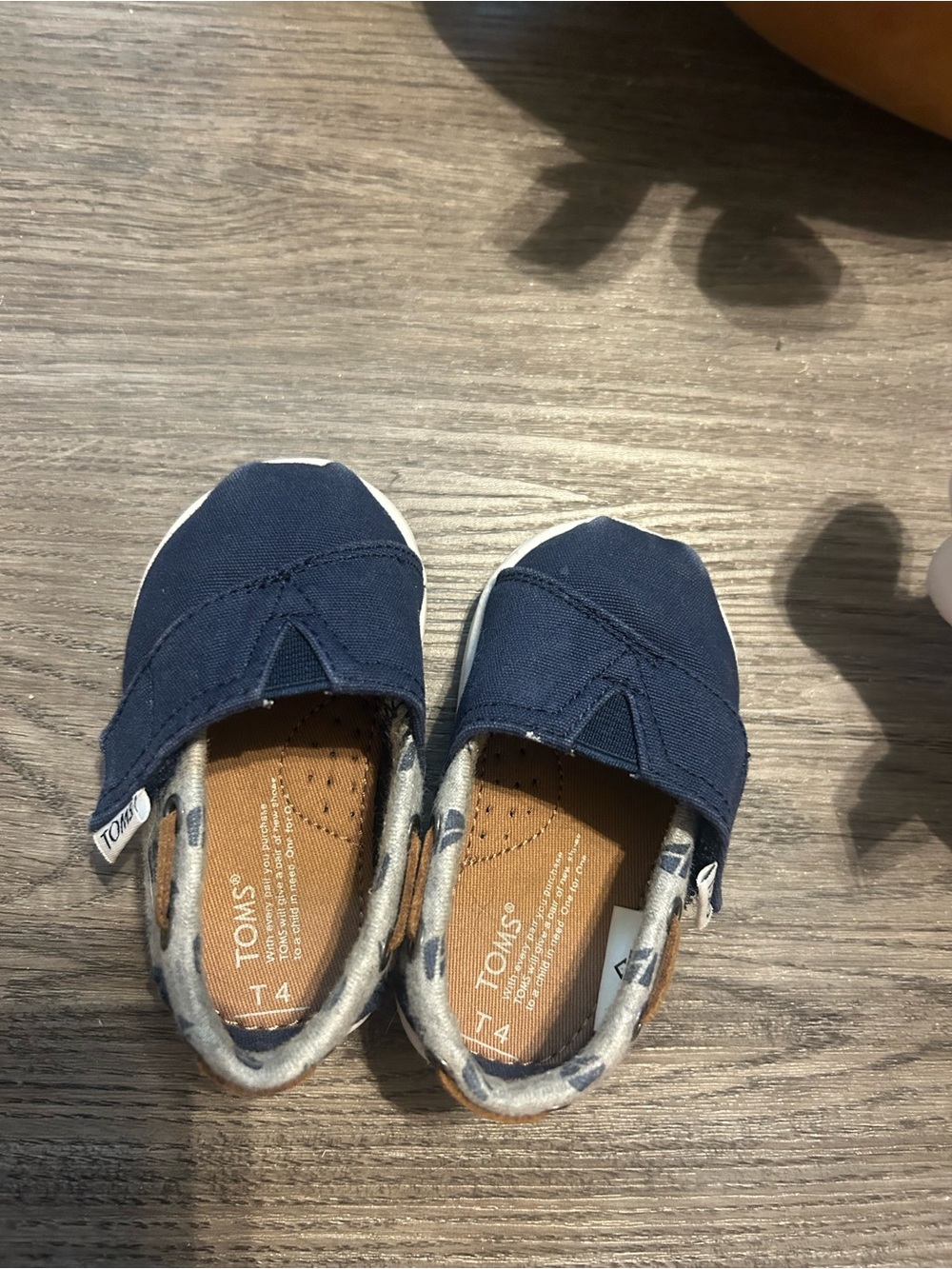 TOMS Kids Navy Canvas Slip-On Moccasins with Patterned Trim